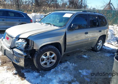 2003 GMC Envoy Sle z USA, uszkodzony, nr VIN 1GKDS13S232397111
